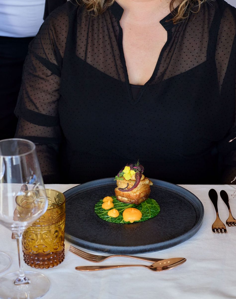 Lady being served dinner