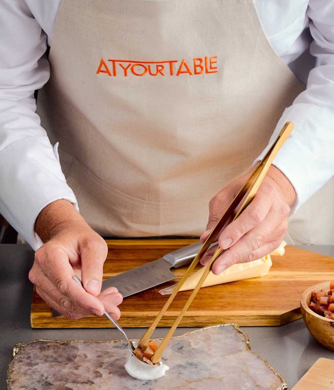 chef preparing dish restaurant kitchen Algarve