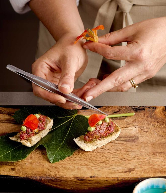 chef preparing dish restaurant kitchen Algarve