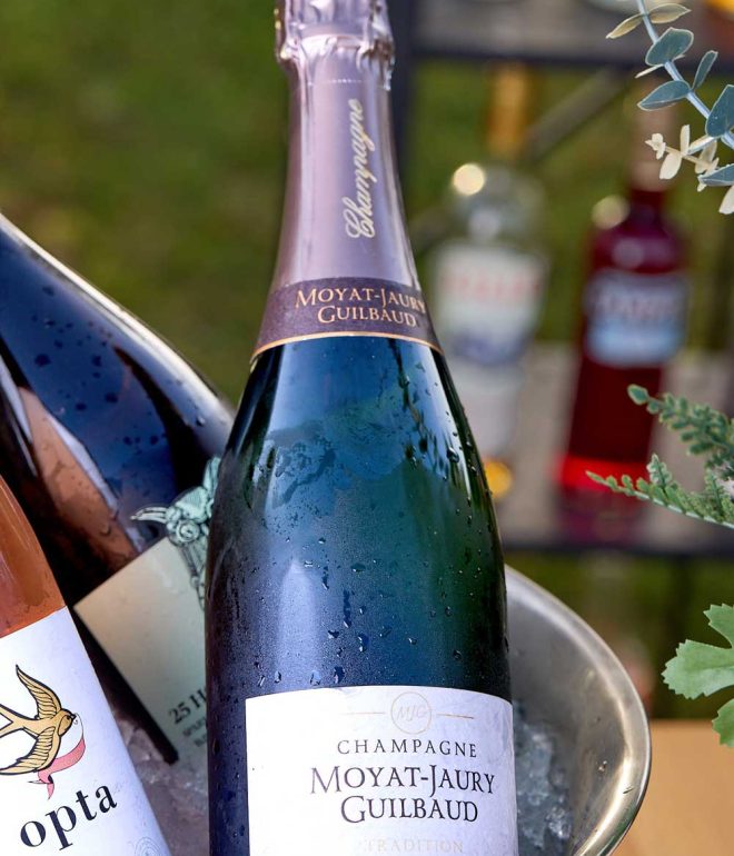 Close up of wine bottle in cooler on bar top outdoors Algarve Portugal