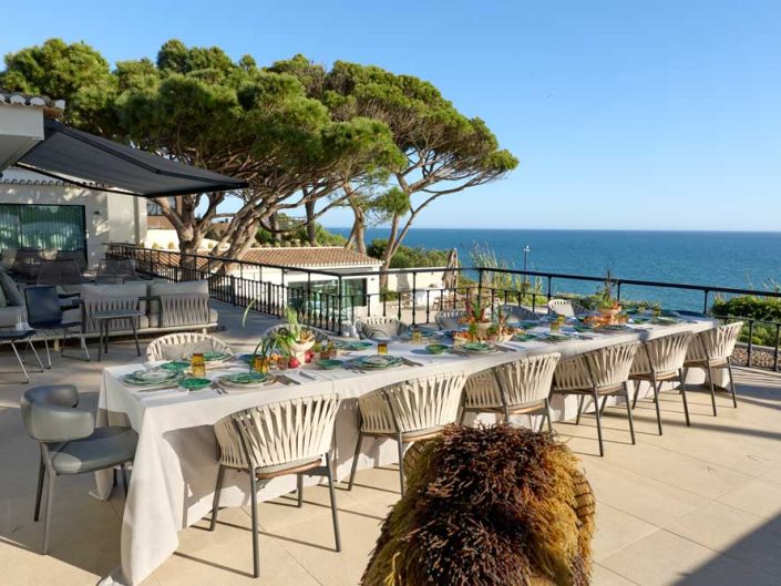 Private dining- table being prepared outside villa Algarve Portugal