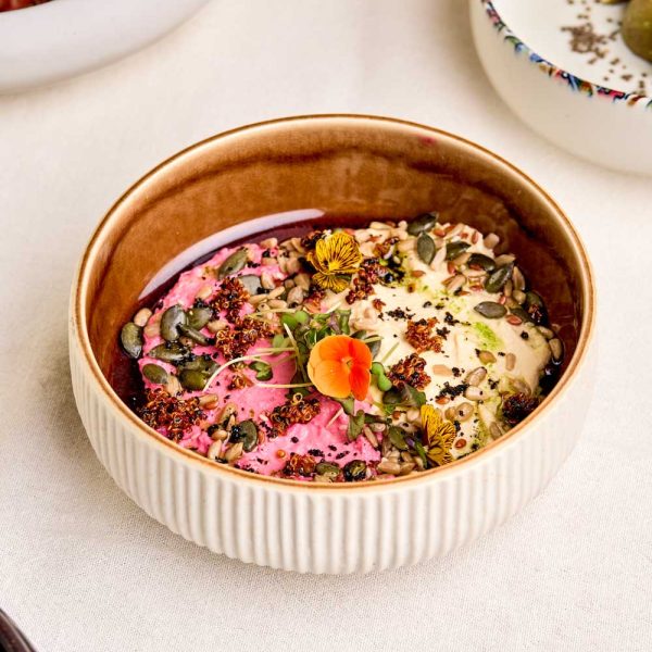 Different dips with garnishes in a bowl on a table Algarve Portugal